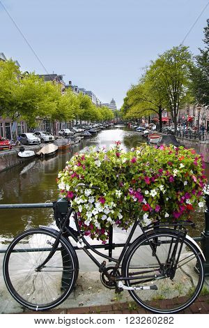 AMSTERDAM; THE NETHERLANDS - AUGUST 18; 2015: View on Leidseplein beetwen Zieseniskade street and Lijnbaansgracht street from bridge Spiegelgracht. Amsterdam is capital of the Netherlands on August 18; 2015.