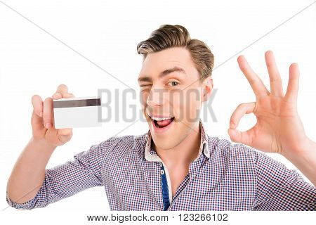 Portrait Of Happy Man Holding Bank Card And Gesturing 