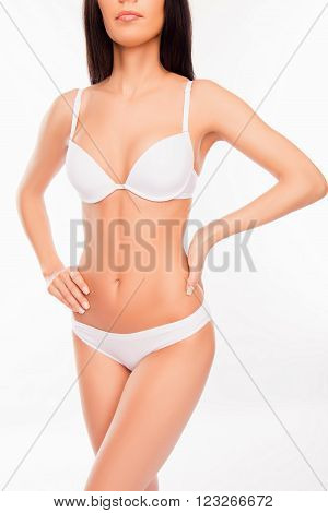 Close Up Photo Of Slim Woman  In Underwear On White Background