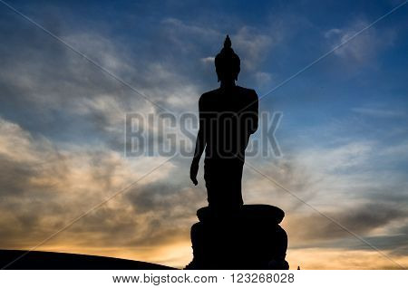 Silhouette of standing big Buddha statue during twilight time