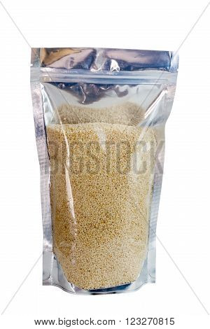 White sesame seeds in packaging foil zip lock bag. Isolated on white