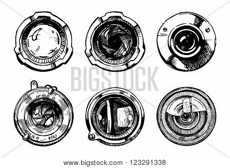 Vector hand drawn illustration of the camera lens set in ink hand drawn style.