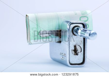 deadbolt with European banknotes inside, still life