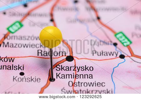 Photo of pinned Skarzysko Kamienna on a map of Poland. May be used as illustration for traveling theme.