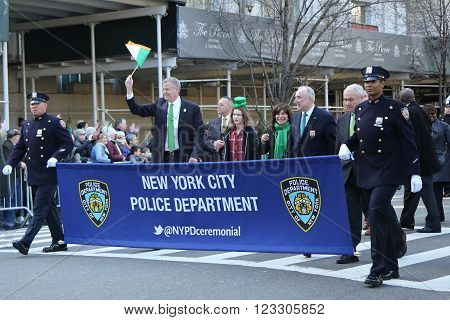 NEW YORK - MARCH 17, 2016: New York's mayor Bill De Blasio (L) and Police Commissioner William Bratton marching at the St. Patrick's Day Parade in New York.