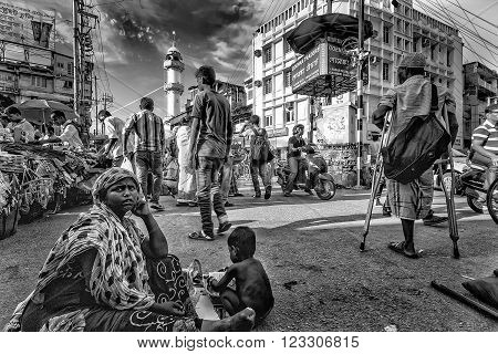 Guwahati Assam India- March 27 - A woman with a child is begging at street
