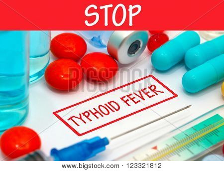 Stop typhoid fever. Vaccine to treat disease. Syringe and vaccine with drugs.