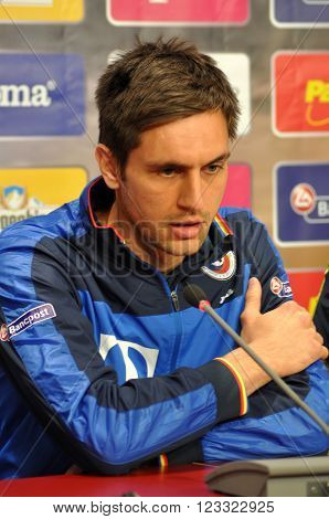 The Coach And Players Of Romania's National Football Team During A Press Conference