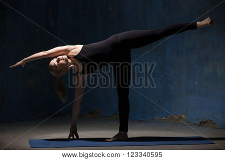 Beautiful Yoga Woman Doing Ardha Chandrasana Pose