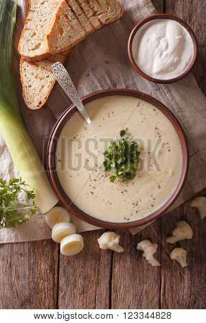 Cauliflower Cream Soup And Ingredients Close-up On. Vertical Top View