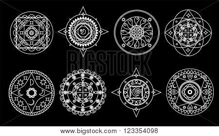 Set of white mandalas on black background