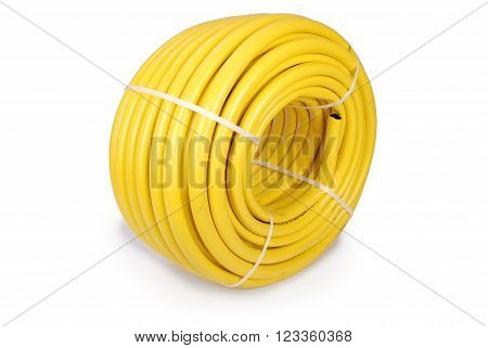 Garden water hose rolled up in a tangle isolated on white