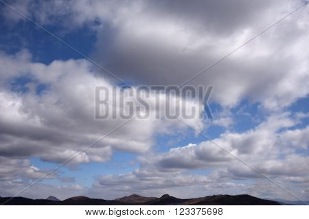White and gray clouds in the blue sky