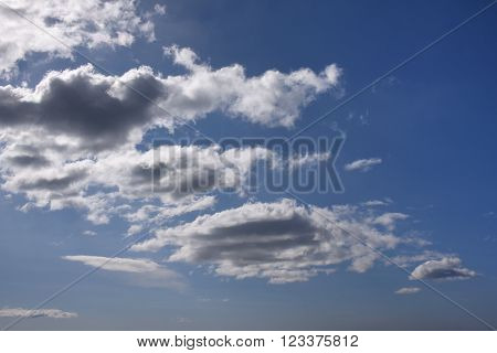 White and gray clouds in the blue sky