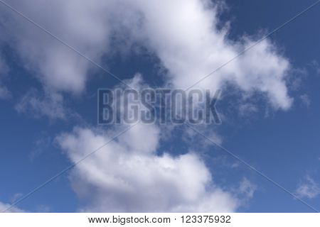 White and gray clouds in the blue sky