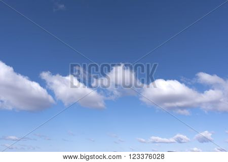 White and gray clouds in the blue sky