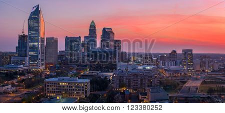 The amazing and colorful sky in Uptown Charlotte, North Carolina right before sunrise on a beautiful spring morning.