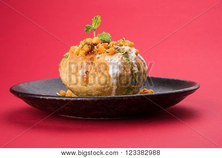 Rajasthani Shahi Raj Kachori, stuffed katchori with potato and sprout filling and served with curd, chutney and sev