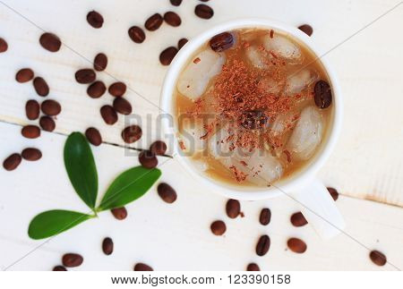 Cold coffee with milk, ice, chocolate. Summer refreshing coffee drink.