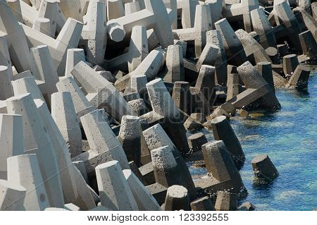 Concrete tetrapods used for protection against erosion slong the shoreline