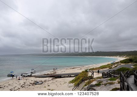 HAMELIN BAY,WA,AUSTRALIA-JANUARY 17,2016: View of Boat launch with people from overlooking boardwalk with the turquoise Indian Ocean seascape on a stormy day in Hamelin Bay, Western Australia.