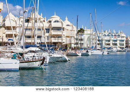 BENALMADENA, SPAIN - MARCH 5, 2016: View of Puerto Marina leisure port in a sunny day in March 5, 2016 in Benalmadena, Spain. Puerto Marina is one of the biggest leisure ports in Andalusia, and is located at Costa del Sol.