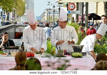 PARIS / FRANCE - September 23 2011: Street cooking presentation of the FRERES BLANC company in the Avenue des Champs-Elysees