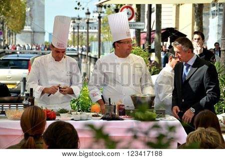 PARIS / FRANCE - September 23 2011: Street cooking presentation of the FRERES BLANC company in the Avenue des Champs-Elysees