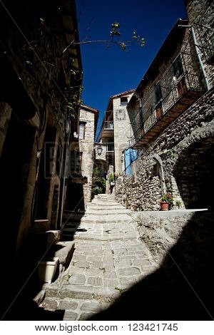 Medieval cobbled street in Peille Cote d'Azur France.