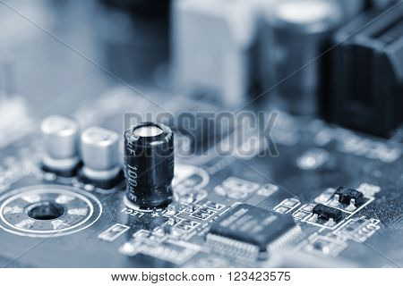 Components on board. PCB to PC. Chip, capacitor and connectors on the motherboard of a personal computer. Modern technological background.
** Note: Shallow depth of field
