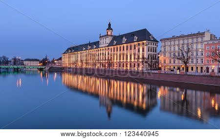 Wroclaw university, view from river Odra, in the evening. Poland. Europe.