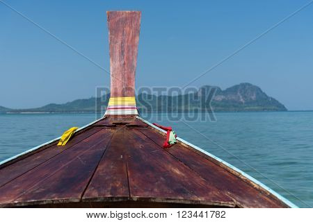 Thai Wooden Head Longtail Boat Heads Toward
