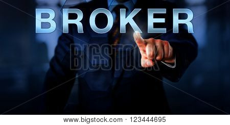 Manager is touching the word BROKER on a virtual touch screen interface. Business concept for the role of an independent agent trader facilitator negotiator mediating between a seller and a buyer.