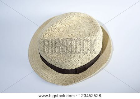 Old straw hat on a white background.