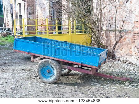 Old cart of blue ironi in a italian country