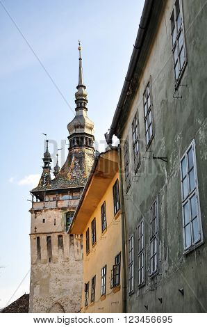 Low Angle View Of The Clock Tower At Sighisoara In Romania, Saxon Landmark