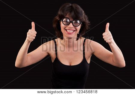 Portrait of a geeky young woman with double thumbs up