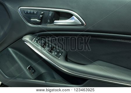 NONTHABURI - MARCH 23: Door Panel with Power window Controller of NEW Mercedes Benz CLA 200 Urban on display at The 37th Bangkok International Motor show on MARCH 23, 2016 in Nonthaburi, Thailand.