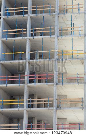 Monolithic frame construction of the building. Solid walls of concrete. Formwork for walls made of concrete. Construction of the building. Masonry walls and aerated concrete masonry walls