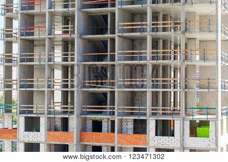Monolithic frame construction of the building. Solid walls of concrete. Formwork for walls made of concrete. Construction of the building. Masonry walls and aerated concrete masonry walls