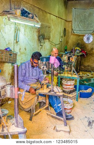 BETHLEHEM, PALESTINE - FEBRUARY 18, 2016: One of the most popular profession in the city is a souvenir maker on February 18 in Bethlehem.