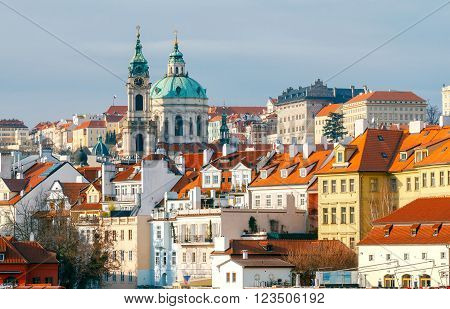 View of the old town and the church of St. Nicholas in Prague.
