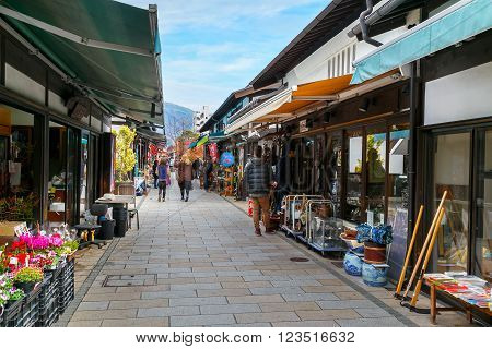 MATSUMOTO JAPAN - NOVEMBER 21 2015: Nawate Dori a shopping street that gives the feel of city's history as a castle town with around 50 shops vary from antique dealers and 'dagashi' candy stores