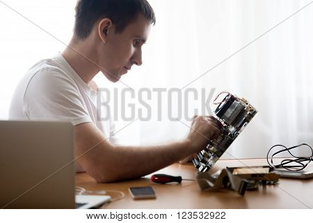 Young Computer Engineer Working