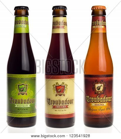 GRONINGEN, NETHERLANDS - MARCH 24, 2016: Belgian beers Troubadour Westkust, Obscura and Magma isolated on a white background