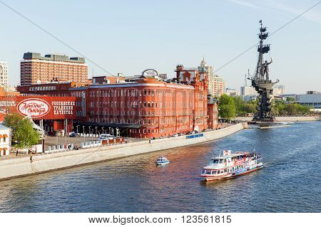 MOSCOW RUSSIA - May 9, 2015: Panorama view of Moscow from Patriarshiy bridge. Famous Moscow landmarks - onument to Russian emperor Peter the Great Red October factory Central House of Artists.