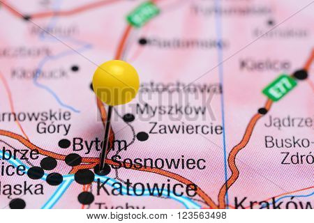 Photo of pinned Sosnowiec on a map of Poland. May be used as illustration for traveling theme.