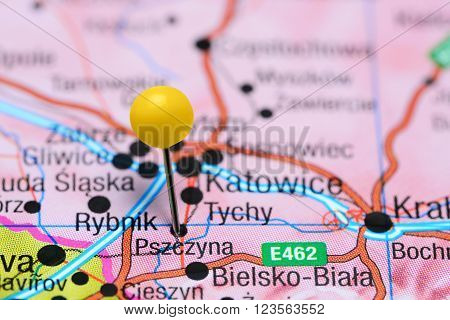 Photo of pinned Pszczyna on a map of Poland. May be used as illustration for traveling theme.
