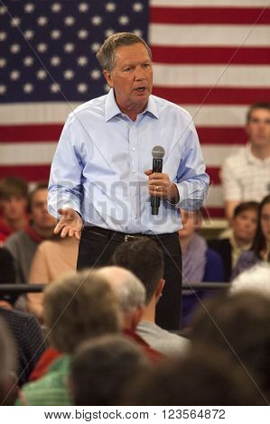 MADISON WI/USA - March 28 2016: Republican presidential candidate John Kasich speaks to a group of supporters during a town hall event before the Wisconsin presidential primary in Madison Wisconsin.