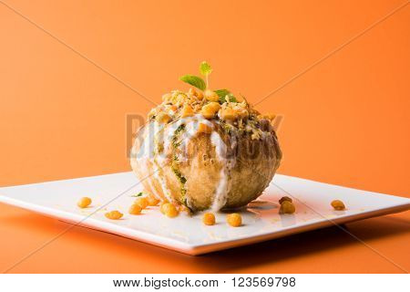 Rajasthani Shahi Raj Kachori, stuffed katchori with potato and sprout filling and served with curd, chutney and sev